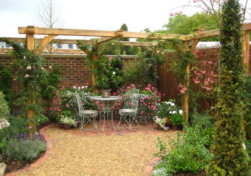 wooden pergola kit made from Oak frame in the garden for nice quiet seating corner area