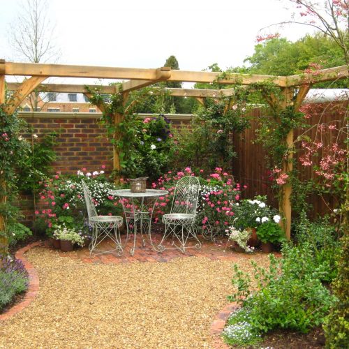wooden pergola kit made from Oak frame in the garden for nice quiet seating corner area