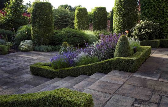 commercial garden maintenance and large garden maintenance - specialist pruning of plants and trees, garden topiary, weeding of flowerbeds, lawn mowing, strimming, hedge cutting